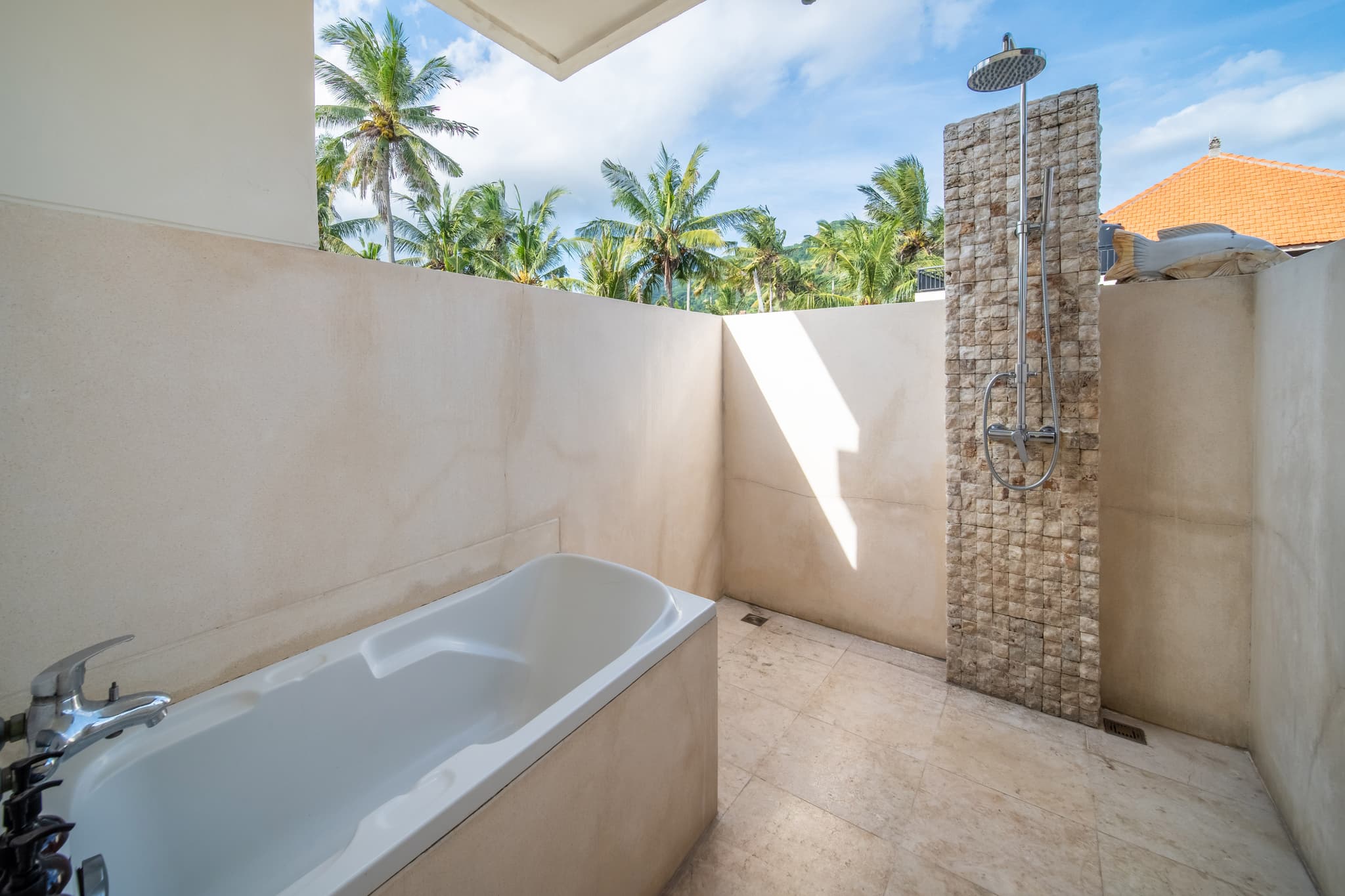 Villa Cocoa Maya Joglo Suite bathroom with bath and shower