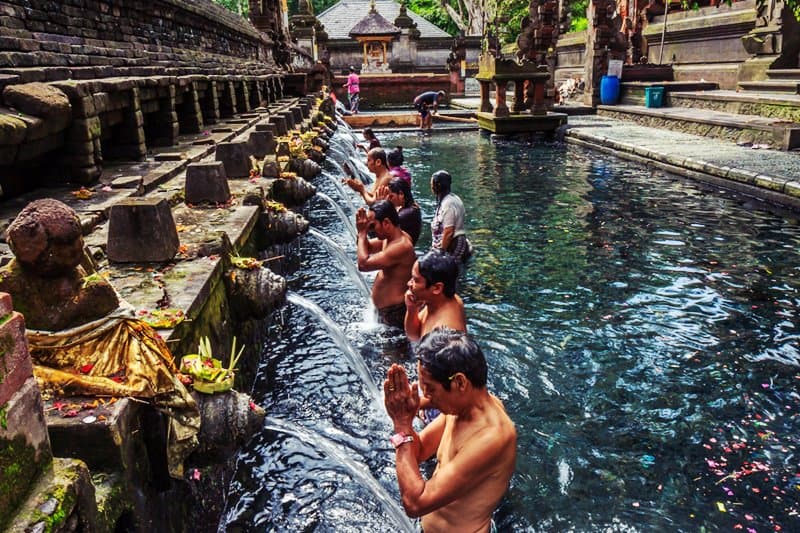 Water purification ceremonies at Tirta Empul near Villa Sagitta
